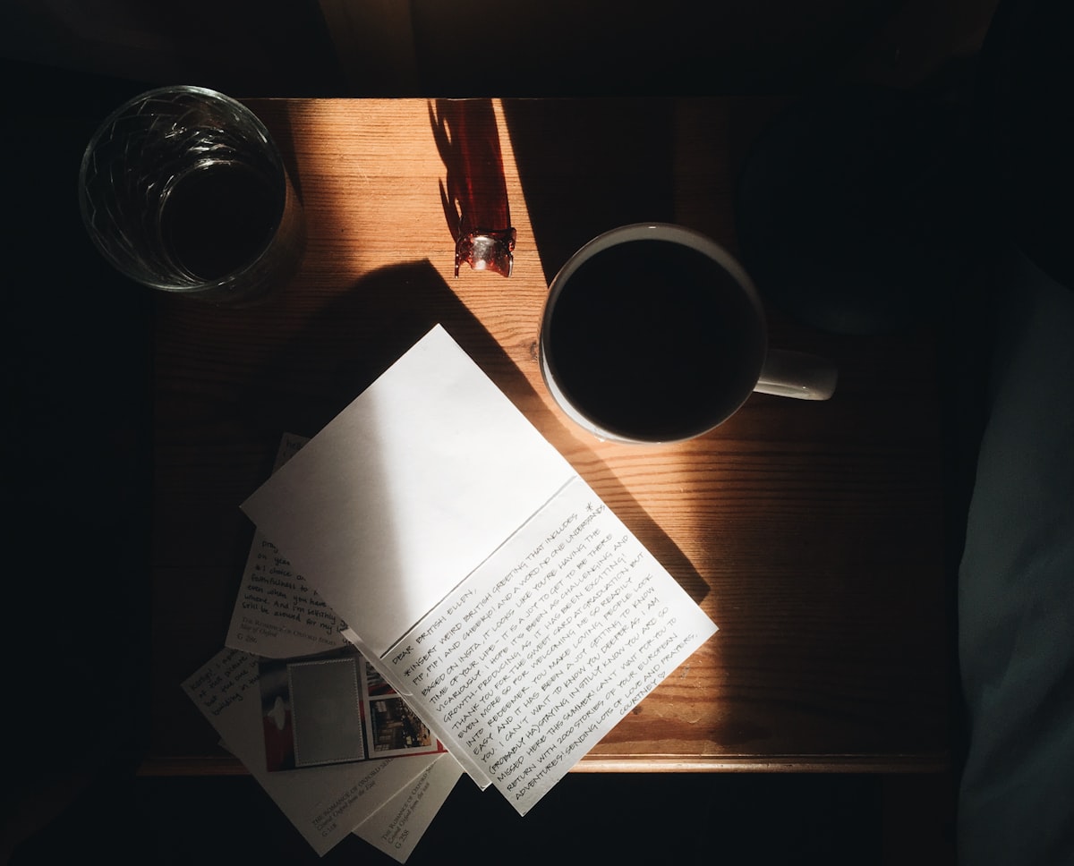 A blank sheet of paper resting on a clean table, a quiet invitation to begin writing